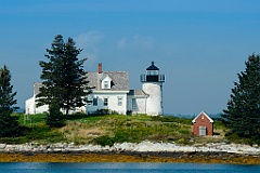Weathered Pumpkin Island Lighthouse on a Summer Day